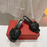 Side profile view of Valentino Garavani luxury piece style No.249