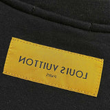 Close-up detail shot of Louis Vuitton luxury clothing with relaxed-fit cut