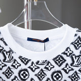 Close-up detail shot of Louis Vuitton cotton t-shirt with monogram-inspired silhouette