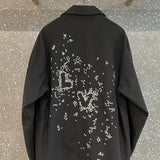 Back view of Louis Vuitton luxury clothing with runway-inspired design