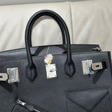 Side view of statement structured handbag