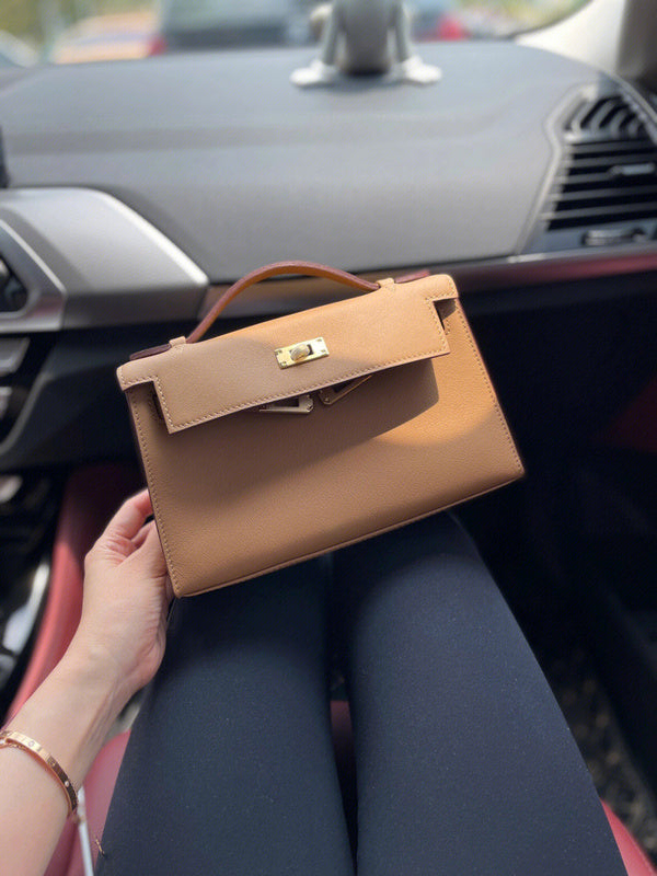 Side view of streamlined structured handbag