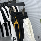 Front view of Rhude luxury clothing with streetwear-inspired cut