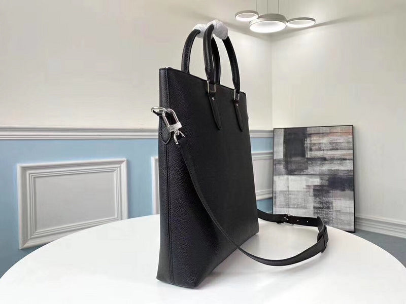 Styled lifestyle shot of structured sleek women's handbag – women's statement bag