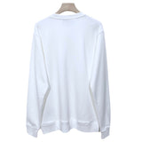 Side profile of Gucci luxury clothing with relaxed-fit cut