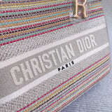 Back view of polished classic women's handbag – women's luxury accessory
