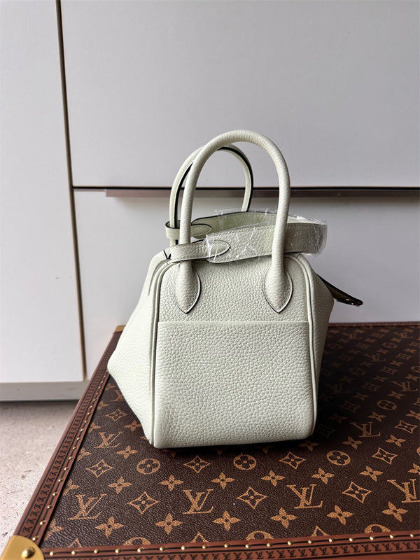  graceful top-handle bag detail view showing craftsmanship