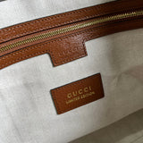 Side profile of everyday-luxe structured women's handbag – women's luxury accessory