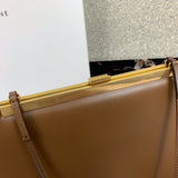 Side profile of structured refined women's handbag – women's everyday handbag