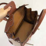 Side view of polished structured handbag