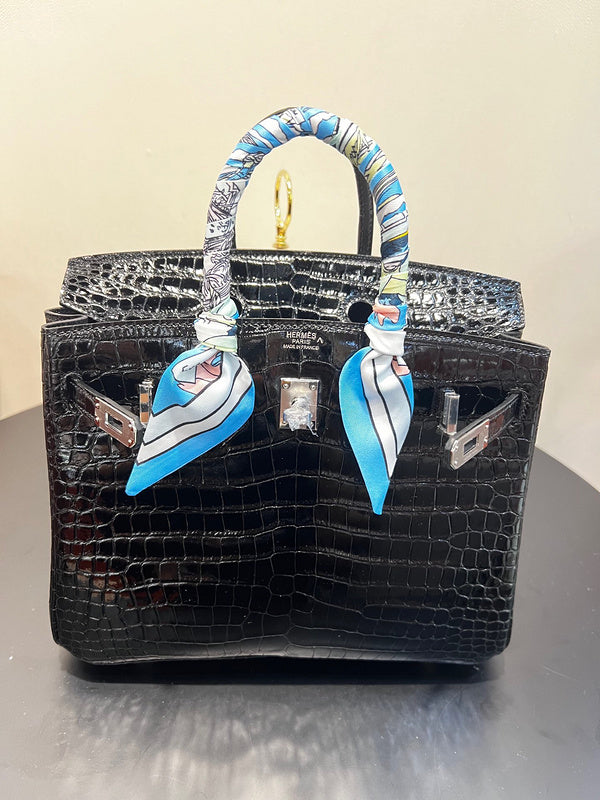 Side view of classic structured handbag