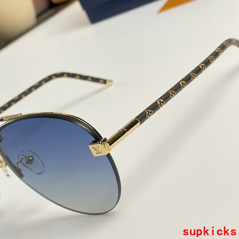 Close-up detail view of Louis Vuitton unisex sunglasses