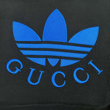 Full styled look of Gucci luxury clothing with monogram-inspired silhouette