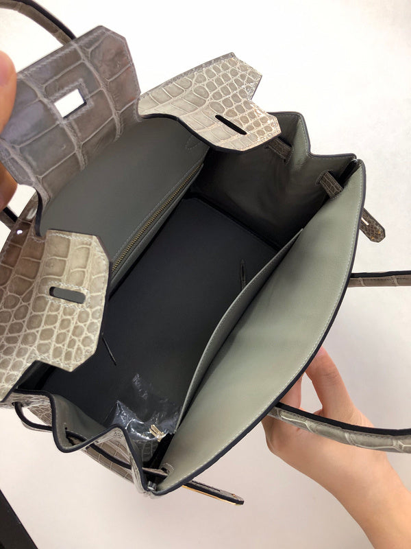 Side view of structured structured handbag