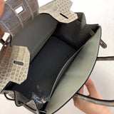 Side view of structured structured handbag