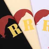 Close-up detail shot of Rhude luxury clothing with streetwear-inspired cut