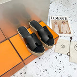Hermès Tan Flat Thong Sandals - Full Silhouette View