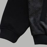 Front view of Louis Vuitton luxury clothing with signature branding