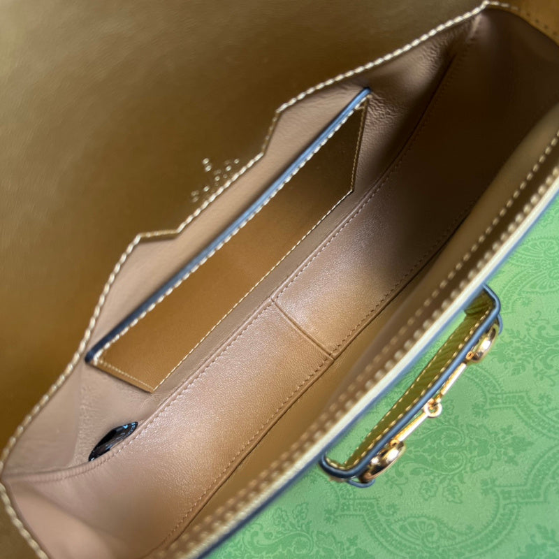 Side profile of refined structured women's handbag – women's statement bag