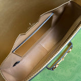 Side profile of refined structured women's handbag – women's statement bag