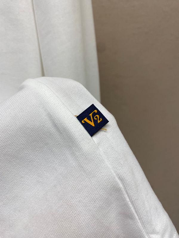 Front view of Louis Vuitton luxury clothing with runway-inspired design