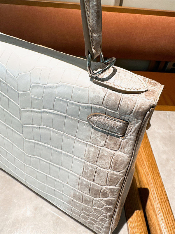 Side view of polished structured handbag