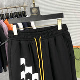 Close-up detail shot of Rhude luxury clothing with logo-detail design