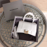 Side profile of structured signature women's handbag – women's premium purse