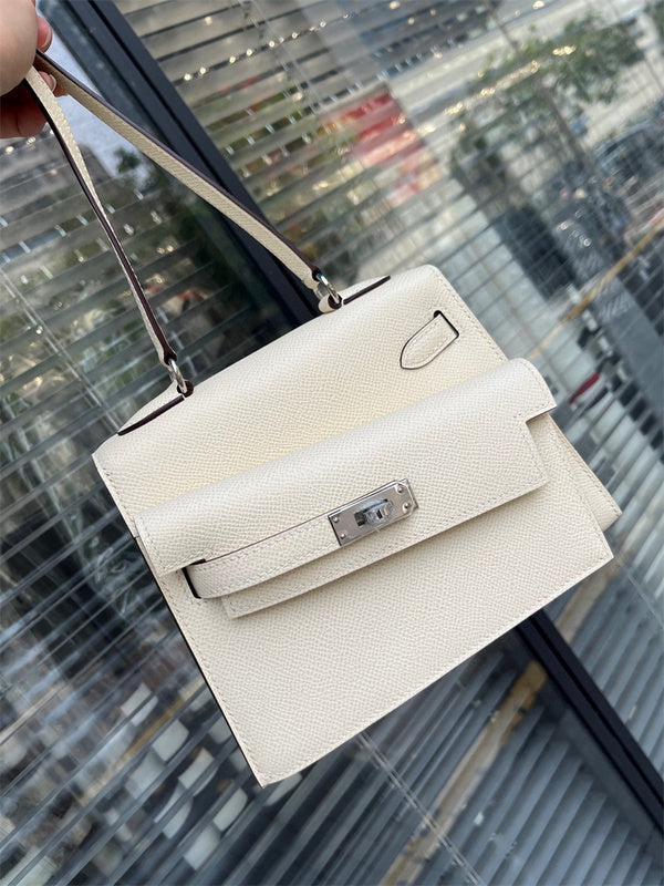 Side view of sculpted structured handbag