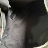 Close-up detail of structured classic women's handbag – women's luxury accessory