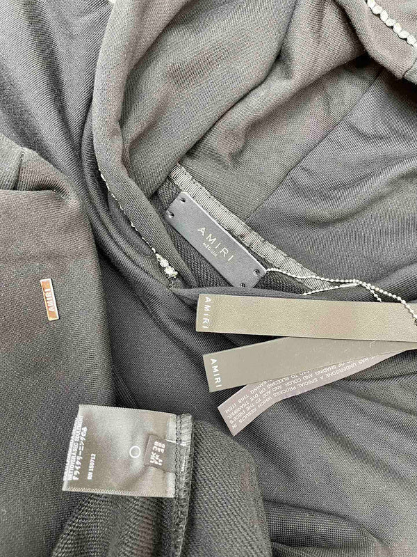 Texture and finish detail of Amiri luxury piece style No.081