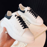 Alexander McQueen all-black luxury sneakers view 5 cushioned comfort fit