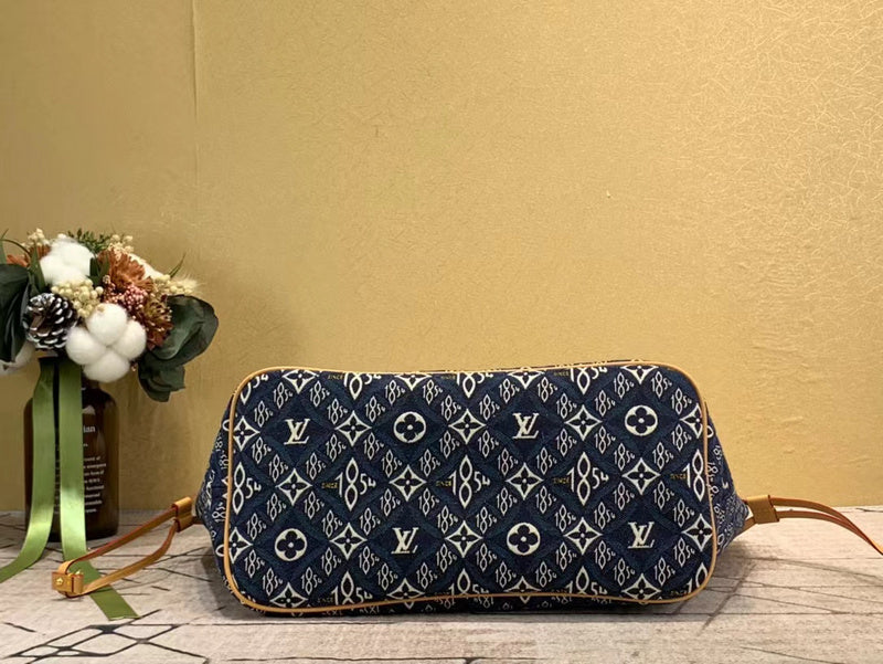 Styled lifestyle shot of sleek refined women's handbag – women's statement bag