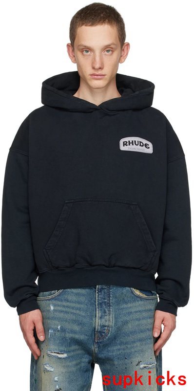Back view of Rhude luxury clothing with signature branding