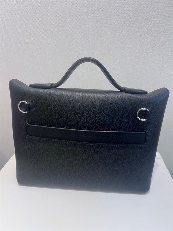 Side view of fluid structured handbag