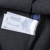 Close-up detail shot of Louis Vuitton luxury clothing with runway-inspired design