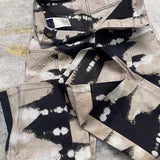 Full styled look of Louis Vuitton luxury clothing with label-forward styling
