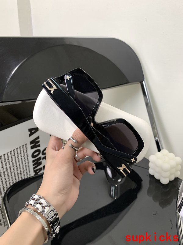 Lifestyle view of Louis Vuitton unisex sunglasses