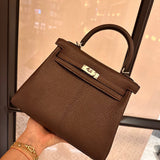  Refined tote bag carried on shoulder
