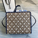 Side profile of statement signature women's handbag – women's everyday handbag