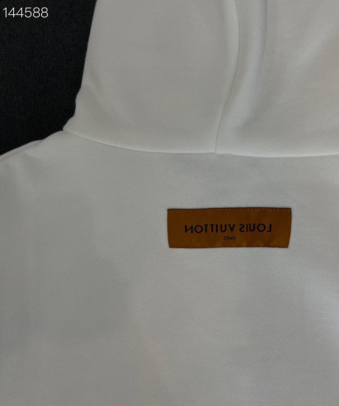 Side profile of Louis Vuitton luxury clothing with contemporary cut