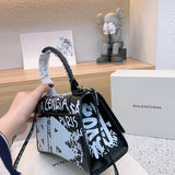 Ziva's Charm handbag – back view (one versatile size)