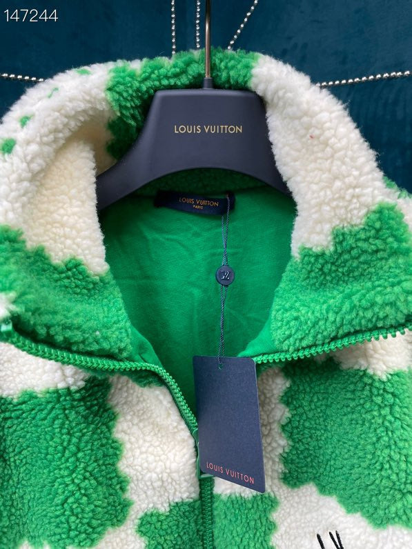 Side profile of Louis Vuitton luxury clothing with signature branding
