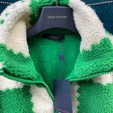 Side profile of Louis Vuitton luxury clothing with signature branding