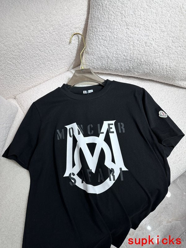 Side profile of Moncler luxury clothing with monogram-inspired silhouette