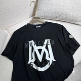 Side profile of Moncler luxury clothing with monogram-inspired silhouette