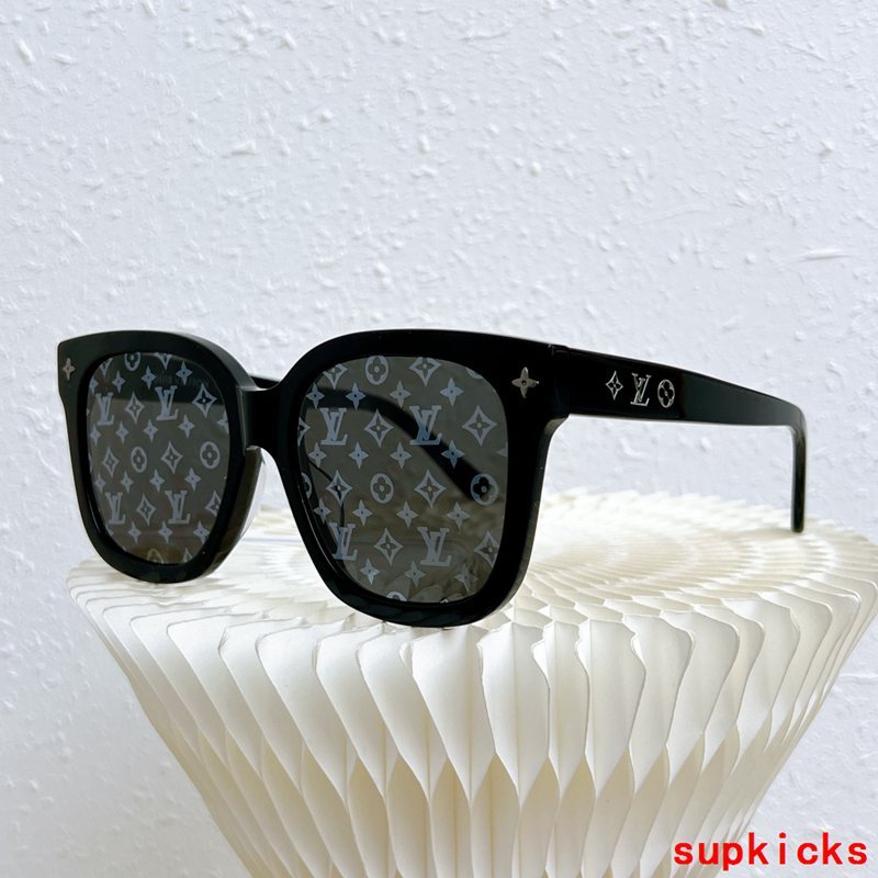 Close-up detail view of Louis Vuitton unisex sunglasses