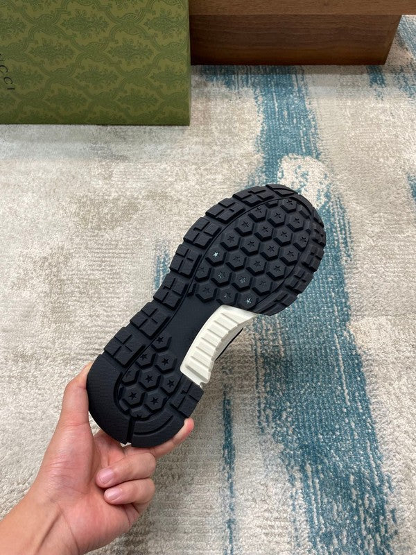 Side profile of Gucci classic monochrome sneakers cushioned comfort fit