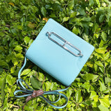 Close-up detail of poised bag design