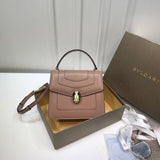 Sleek Vegan Leather Handbag - Statement Silhouette | Women's Statement Accessory #1761 - front view (image 1) of designer-inspired handbag